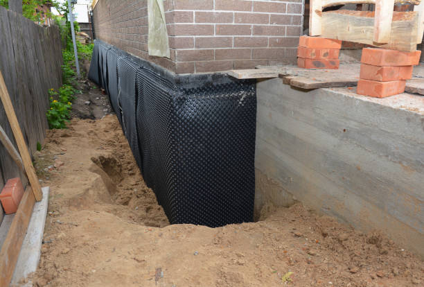 SJ Waterproofing Pros technician performing targeted Waterproofing assessment in Bladensburg, MD